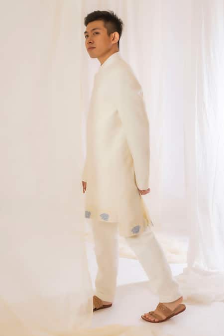 Shop Vaani Beswal Off White Handwoven Silk Floral, Butti Asymmetric Bandhgala Online at Aza Fashions Shop_Vaani Beswal_Off White Handwoven Silk Floral, Butti Asymmetric Bandhgala _Online_at_Aza_Fashions