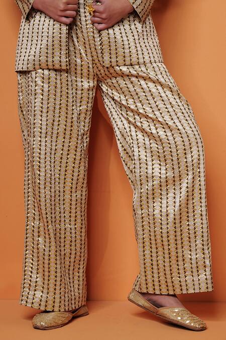 Taisha_Brown Silk Embroidery Pure Katan Flared Pant_at_Aza_Fashions