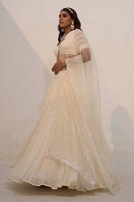 Buy_Nayna Kapoor_Ivory Georgette Embellished Cutdana Cut-out Flower Sequin Bridal Lehenga Set _Online_at_Aza_Fashions