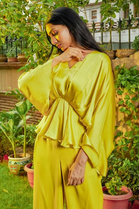 Buy_Omana By Ranjana Bothra_Yellow Satin V-neck Cowl Sleeve Peplum Top And Trouser Set _Online_at_Aza_Fashions
