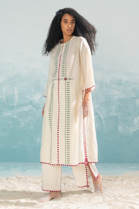 Ikai By Ragini Ahuja_Ivory Cotton Cut Work, Applique Nile Cut-work Hem And Slit Pant_Online_at_Aza_Fashions