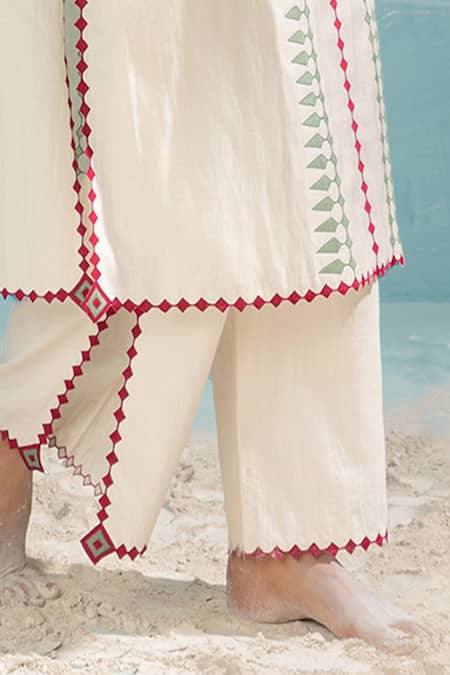 Shop_Ikai By Ragini Ahuja_Ivory Cotton Cut Work, Applique Nile Cut-work Hem And Slit Pant_Online_at_Aza_Fashions