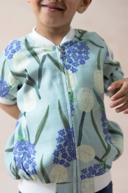 Thetaa Blue Cotton, Polyester, Satin Embroidery Tulip Print Bomber Jacket at Aza Fashions Thetaa_Blue Cotton, Polyester, Satin Embroidery Tulip Print Bomber Jacket _at_Aza_Fashions
