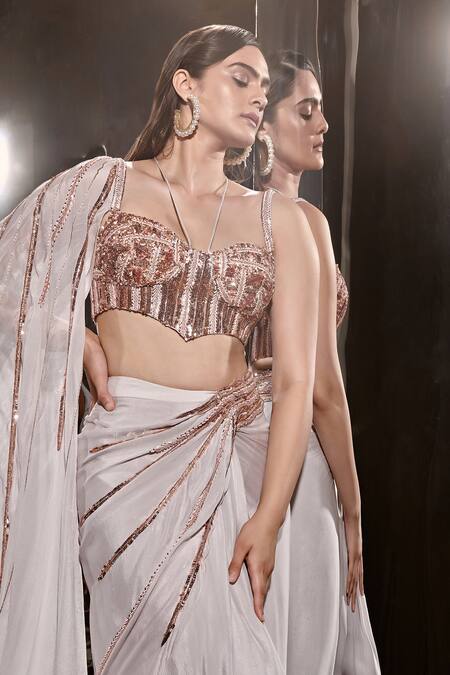 Buy Masumi Mewawalla Pink Crepe Sequins, Cut Work, Crystals Embellished Skirt With Corset Blouse Online at Aza Fashions Buy_Masumi Mewawalla_Pink Crepe Sequins, Cut Work, Crystals Embellished Skirt With Corset Blouse _Online_at_Aza_Fashions