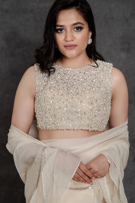 Buy Sunita Bhandari Ivory Viscose, Organza, Net Ruffle Pre-draped Saree With Embroidered Blouse Online at Aza Fashions Buy_Sunita Bhandari_Ivory Viscose, Organza, Net Ruffle Pre-draped Saree With Embroidered Blouse _Online_at_Aza_Fashions