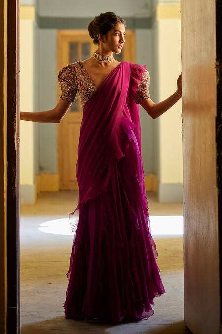 Buy Mrunalini Rao Magenta Chiffon, Silk Zari, Embroidery V-neck Ruffle Saree With Floral Blouse Online at Aza Fashions Buy_Mrunalini Rao_Magenta Chiffon, Silk Zari, Embroidery V-neck Ruffle Saree With Floral Blouse _Online_at_Aza_Fashions