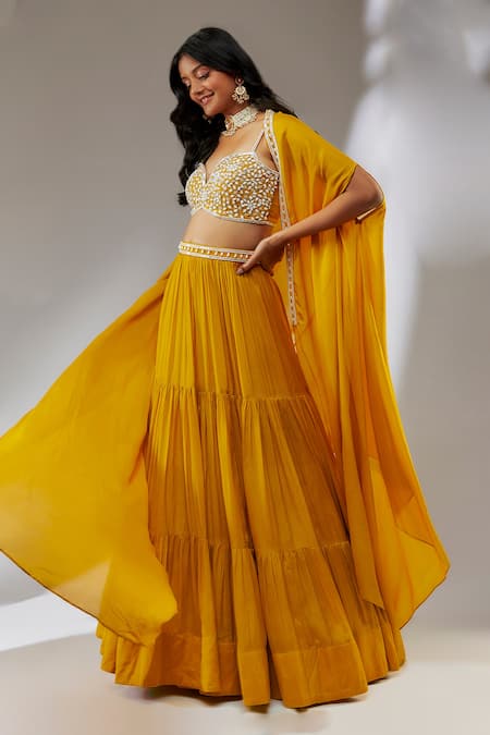 Buy_Neha Khullar_Yellow Chiffon, Crepe Cut Work, Pearls Sweetheart Neck Tiered Lehenga Cape Set _Online_at_Aza_Fashions