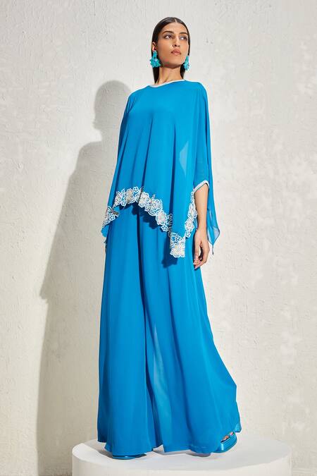 Namrata Joshipura_Blue Georgette Hand Embellished Floral Patterns Round Wisteria Cape Jumpsuit_at_Aza_Fashions