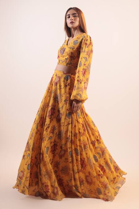 Label Shristi Chetani_Yellow Crepe, Georgette Beads V-neck Floral Pattern Lehenga Set_at_Aza_Fashions