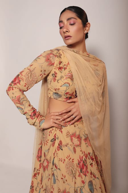 Label Shristi Chetani_Beige Crepe, Georgette Beads Floral Pattern Lehenga Embellished Blouse Set _at_Aza_Fashions