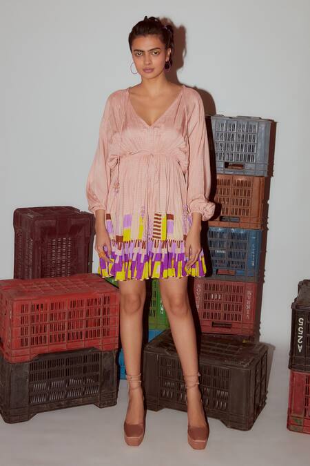 Nirmooha_Peach Muslin Tassels Plunge Neck Geometric Print Tie-up Detail Dress _Online_at_Aza_Fashions