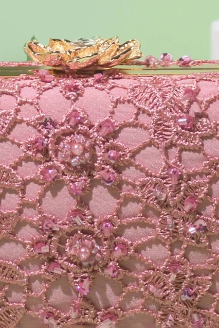 Shop Amyra Pink Embroidery, Crystals Cordon Flower Capsule Clutch Online at Aza Fashions Shop_Amyra_Pink Embroidery, Crystals Cordon Flower Capsule Clutch_Online_at_Aza_Fashions