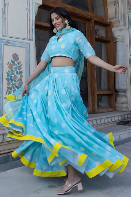 Buy Pomcha Jaipur Blue Muslin, Chiffon Tassels V-neck Daylilly Floral Print Blouse Lehenga Set Online at Aza Fashions Buy_Pomcha Jaipur_Blue Muslin, Chiffon Tassels V-neck Daylilly Floral Print Blouse Lehenga Set _Online_at_Aza_Fashions