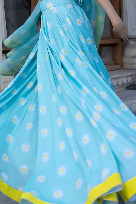 Pomcha Jaipur Blue Muslin, Chiffon Tassels V-neck Daylilly Floral Print Blouse Lehenga Set at Aza Fashions Pomcha Jaipur_Blue Muslin, Chiffon Tassels V-neck Daylilly Floral Print Blouse Lehenga Set _at_Aza_Fashions