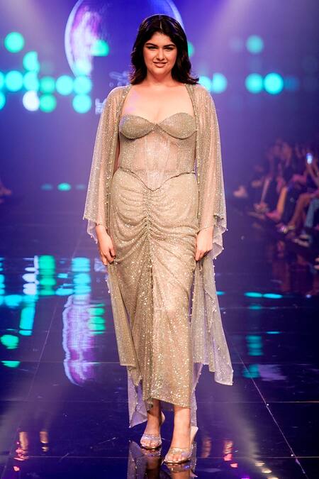 Itrh Grey Net Embellished Crystal Open Frozen Fly Work Cape And Ruched Skirt Set at Aza Fashions Itrh_Grey Net Embellished Crystal Open Frozen Fly Work Cape And Ruched Skirt Set _at_Aza_Fashions