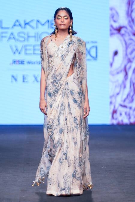 Bhumika Sharma Beige Organza, Georgette Tassels, Embroidery V-neck Blossom Print Saree Cape Set Online at Aza Fashions Bhumika Sharma_Beige Organza, Georgette Tassels, Embroidery V-neck Blossom Print Saree Cape Set _Online_at_Aza_Fashions