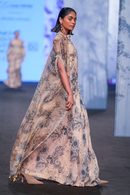 Bhumika Sharma Beige Organza, Georgette Tassels, Embroidery V-neck Blossom Print Saree Cape Set at Aza Fashions Bhumika Sharma_Beige Organza, Georgette Tassels, Embroidery V-neck Blossom Print Saree Cape Set _at_Aza_Fashions
