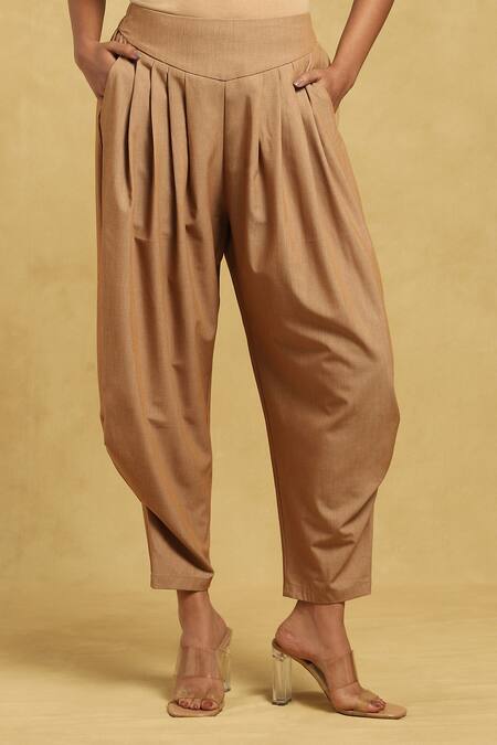 Ritu Kumar_Brown Polyester, Rayon, Spandex Solid Front Pleat Dhoti Pant_Online_at_Aza_Fashions