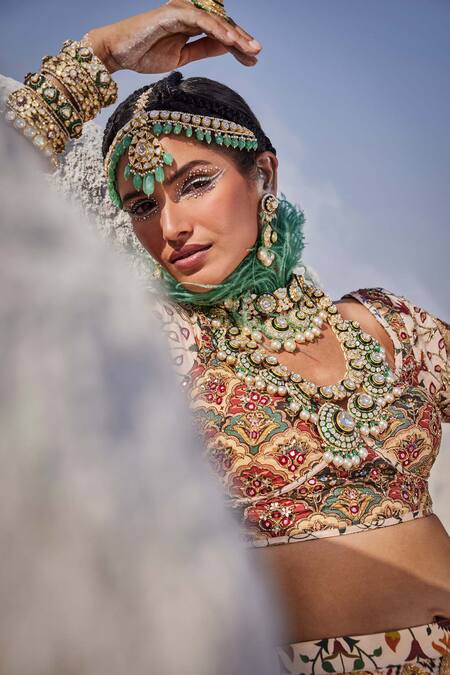 The Royaleum Beige Silk, Crepe Beads, Sequins, Embroidery Round Neck Bridal Lehenga Set Online at Aza Fashions The Royaleum_Beige Silk, Crepe Beads, Sequins, Embroidery Round Neck Bridal Lehenga Set _Online_at_Aza_Fashions