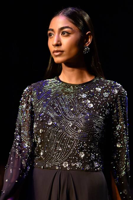 Nachiket Barve_Black Georgette, Linen Beads, Sequins Round Neck Cosmic Cape Sleeve Jumpsuit _Online_at_Aza_Fashions