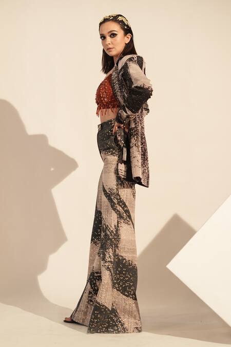Nikita Mhaisalkar_Black Georgette Sequins Brush Stroke Print Broad Hem Pant _Online_at_Aza_Fashions