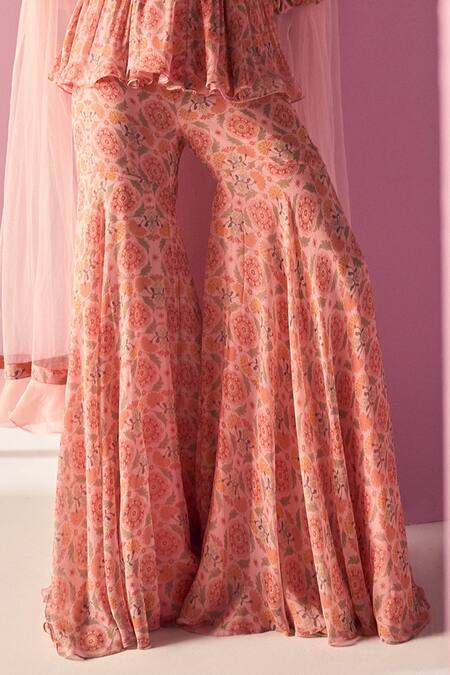 Shop Ridhi Mehra Pink Peplum And Gharara Chiffon Printed Floral V Neck Laiqa Top Set Online at Aza Fashions Shop_Ridhi Mehra_Pink Peplum And Gharara Chiffon Printed Floral V Neck Laiqa Top Set _Online_at_Aza_Fashions