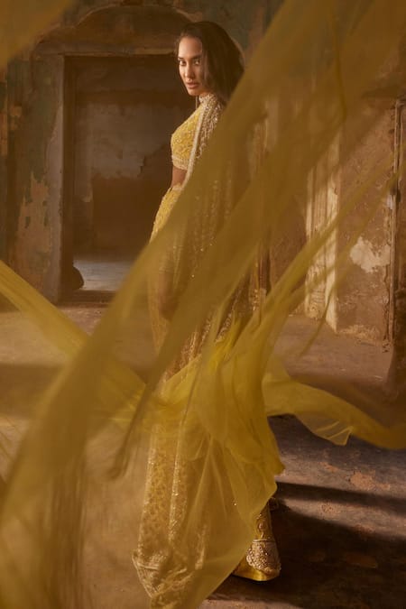 Ridhi Mehra_Yellow Net Embroidery Floral Plunge Amal Lehenga Saree And Blouse Set  _at_Aza_Fashions