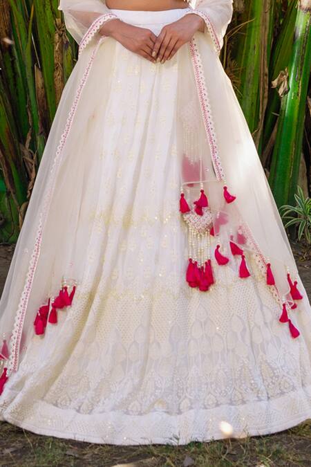 Suruchi Parakh White Georgette, Net Embroidery, Tassels V-neck Thread Blouse Lehenga Set Online at Aza Fashions Suruchi Parakh_White Georgette, Net Embroidery, Tassels V-neck Thread Blouse Lehenga Set _Online_at_Aza_Fashions