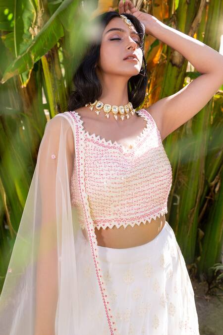 Suruchi Parakh White Georgette, Net Embroidery, Tassels V-neck Thread Blouse Lehenga Set at Aza Fashions Suruchi Parakh_White Georgette, Net Embroidery, Tassels V-neck Thread Blouse Lehenga Set _at_Aza_Fashions