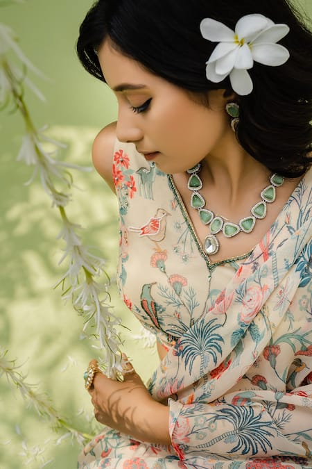 Redpine Designs Off White Viscose Georgette Cutdana, Floral, Pre-draped Saree With Blouse at Aza Fashions Redpine Designs_Off White Viscose Georgette Cutdana, Floral, Pre-draped Saree With Blouse _at_Aza_Fashions