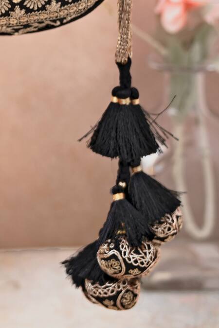 Amyra_Black Embroidery, Tassels Resham Flower Vine Potli Bag _Online_at_Aza_Fashions