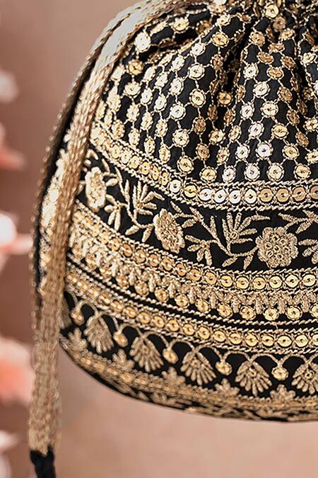 Buy_Amyra_Black Embroidery, Tassels Resham Flower Vine Potli Bag _Online_at_Aza_Fashions