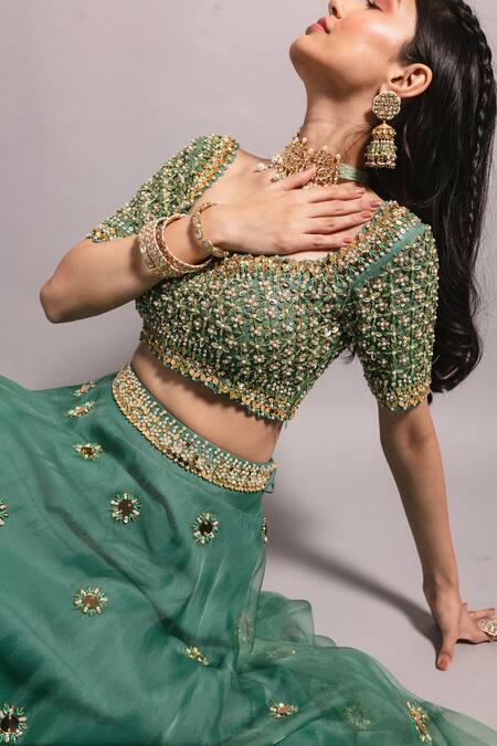 Ria Shah Label_Green Organza Embroidery, Sequins Sweetheart Neck Floral Lehenga Set _at_Aza_Fashions