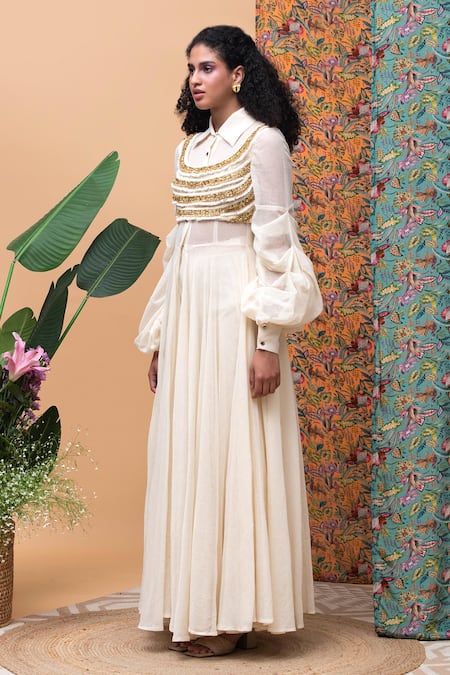 Rishi and Vibhuti Ivory Cotton, Linen Pearls, Tassels Round Kellen Jute Cape And Straight Pant Set at Aza Fashions Rishi and Vibhuti_Ivory Cotton, Linen Pearls, Tassels Round Kellen Jute Cape And Straight Pant Set _at_Aza_Fashions