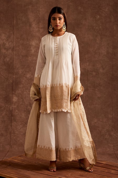 Buy The Home Affair White Chanderi Zari Round Neck Banarasi Pintucked Kurta Sharara Set Online at Aza Fashions Buy_The Home Affair_White Chanderi Zari Round Neck Banarasi Pintucked Kurta Sharara Set _Online_at_Aza_Fashions