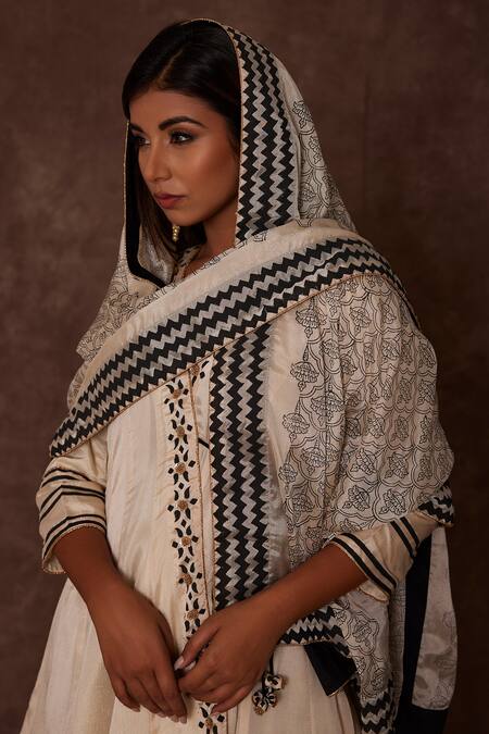 The Home Affair White Chiffon Sequins, Tassels, Monochrome Anghrakha Kurta Dhoti Pant Set at Aza Fashions The Home Affair_White Chiffon Sequins, Tassels, Monochrome Anghrakha Kurta Dhoti Pant Set _at_Aza_Fashions