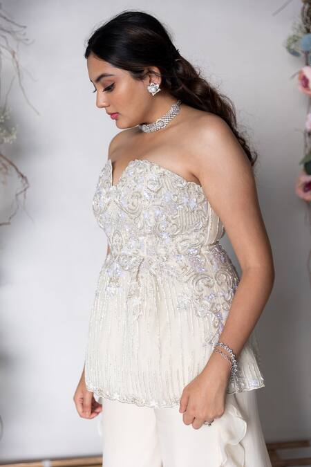 Sunita Bhandari_Ivory Viscose, Organza Cut Work, Embroidery, Sequins Peplum Top And Sharara Set _Online_at_Aza_Fashions