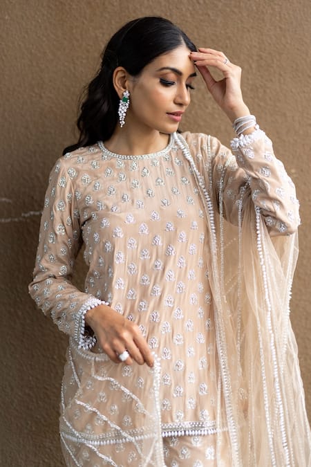 Sunita Bhandari_Beige Net, Viscose Pearls, Embroidery Round Neck Hand Kurta Sharara Set _Online_at_Aza_Fashions