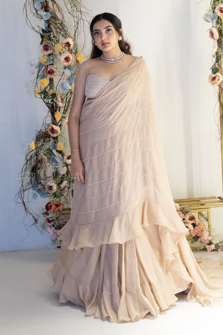 Sunita Bhandari_Beige Viscose, Organza Sequins, Ruffle Lehenga Saree And Embroidered Blouse Set _at_Aza_Fashions