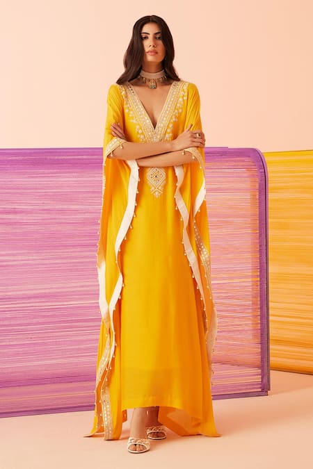 Buy Sureena Chowdhri Yellow Muslin Embroidered Dori Deep V Neck Yoke Kaftan Online at Aza Fashions Buy_Sureena Chowdhri_Yellow Muslin Embroidered Dori Deep V Neck Yoke Kaftan_Online_at_Aza_Fashions