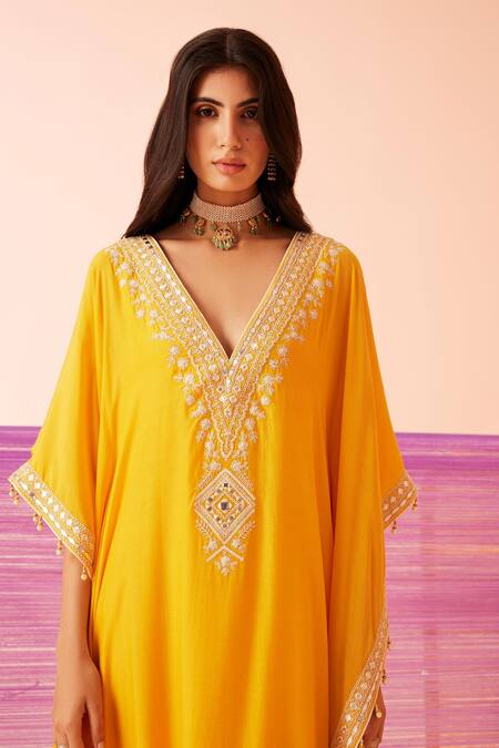 Shop Sureena Chowdhri Yellow Muslin Embroidered Dori Deep V Neck Yoke Kaftan Online at Aza Fashions Shop_Sureena Chowdhri_Yellow Muslin Embroidered Dori Deep V Neck Yoke Kaftan_Online_at_Aza_Fashions