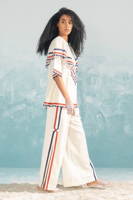 Buy Ikai By Ragini Ahuja Ivory Cotton, Silk, Chanderi Embroidery Round Neck Nile Shoulder Frill Top Online at Aza Fashions Buy_Ikai By Ragini Ahuja_Ivory Cotton, Silk, Chanderi Embroidery Round Neck Nile Shoulder Frill Top_Online_at_Aza_Fashions