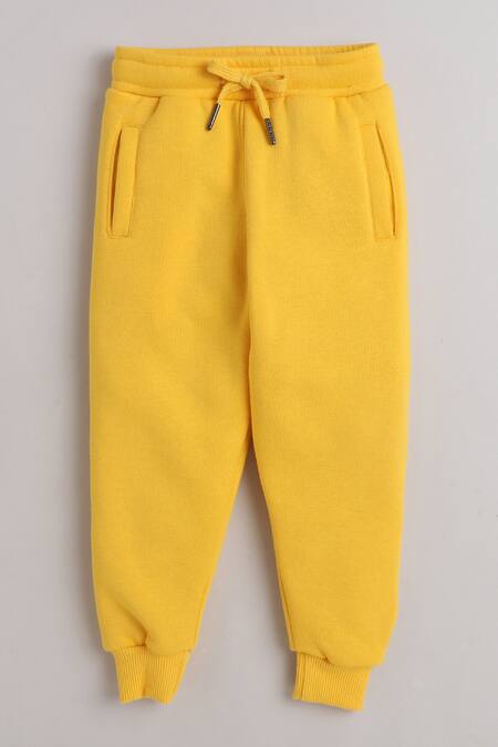 Shop_Knitting Doodles_Yellow Fleece Printed Six Pack Top And Joggers Set_Online_at_Aza_Fashions