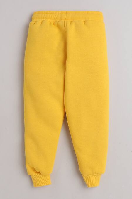 Knitting Doodles_Yellow Fleece Printed Six Pack Top And Joggers Set_at_Aza_Fashions