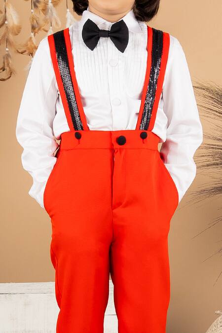The Little Celebs Red Cotton, Lycra Sequins Suspender Pant And Shirt Set Online at Aza Fashions The Little Celebs_Red Cotton, Lycra Sequins Suspender Pant And Shirt Set _Online_at_Aza_Fashions
