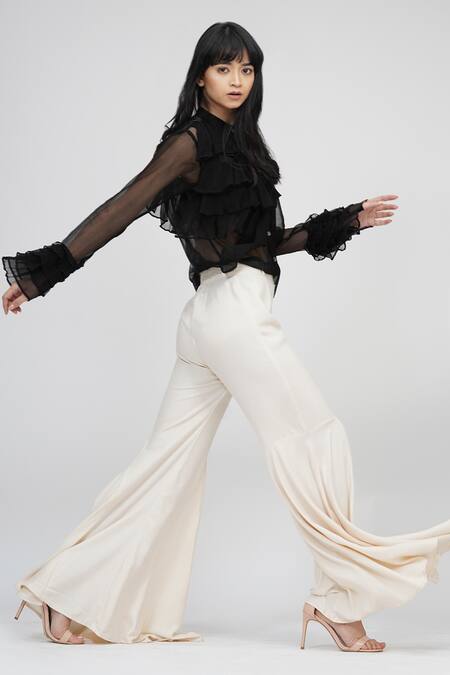 Shruti S_Beige Modal Solid Bell Bottom Pant_at_Aza_Fashions