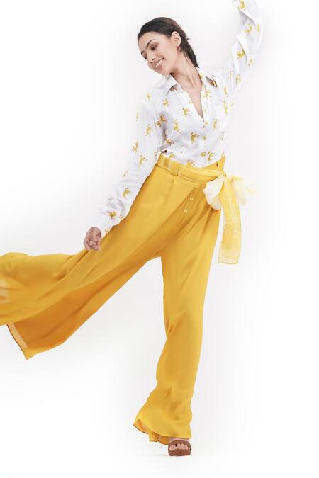Shruti S_Yellow Modal, Organza Gota Patti, Sequins Collared Falling Man Print Jumpsuit_at_Aza_Fashions