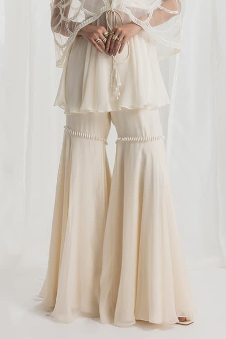 Buy_Seema Thukral_Ivory Net, Georgette, Satin, Organza, Crepe Embellished Peplum Top And Gharara Set _Online_at_Aza_Fashions