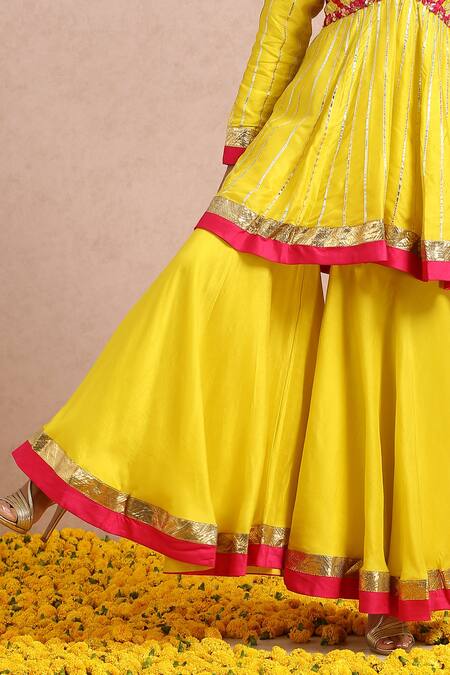 Label Nitika_Yellow Dupatta Net, Madras Silk Gota And Embroidered Peplum Kurta Sharara Set_at_Aza_Fashions