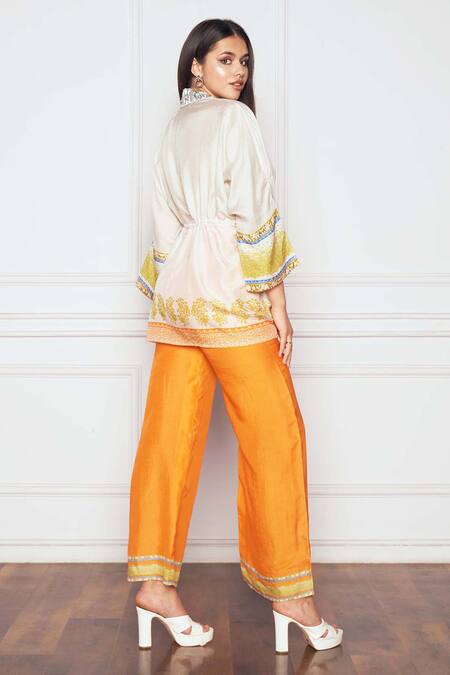 Buy_SAKSHI GIRRI_Ivory Silk Sequins, Embroidery Collared Printed Peplum Kaftan And Pant Set_Online_at_Aza_Fashions